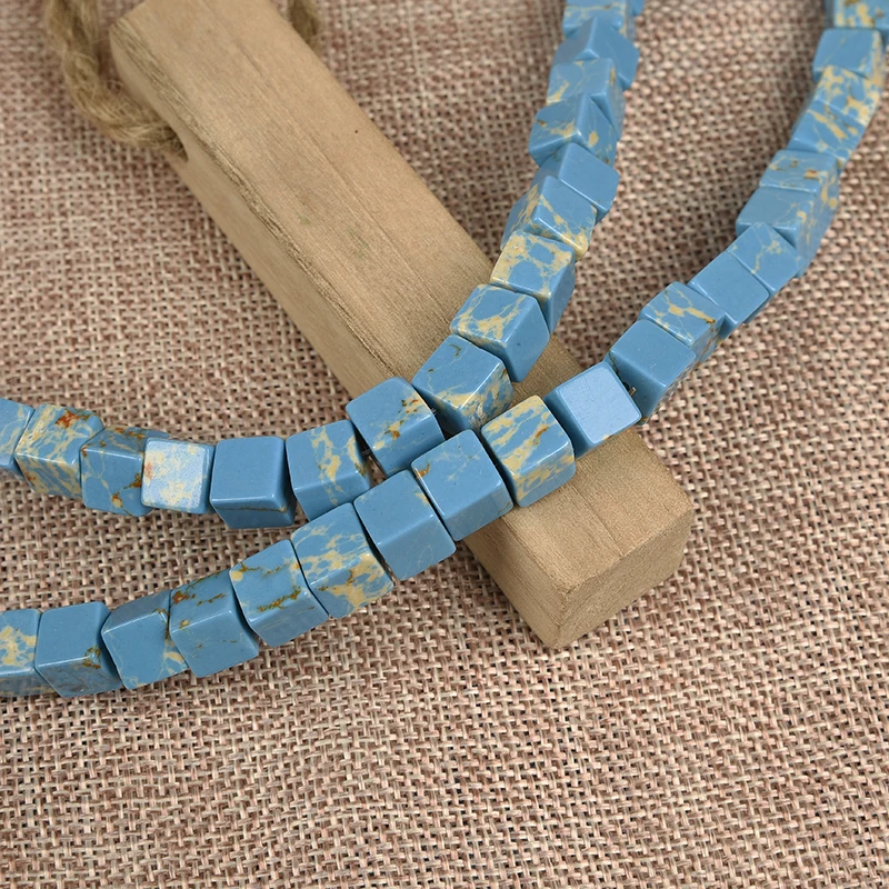 Blue  cube  shape  with  the  Yellow  dotted  spots and  Sharp  polygon  Synthesis  emperor  stone Loose beads Homemade bracelet