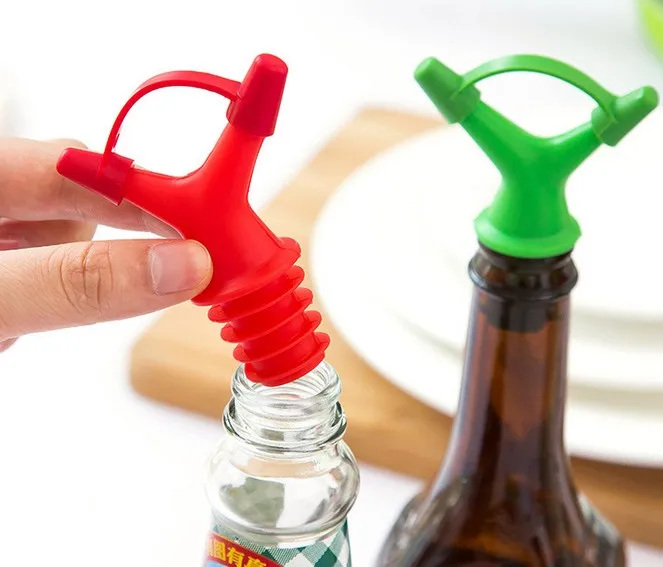 

2pcs/lot Double Oil Bottle Mouth Stopper Sauce Bottles Nozzle Caps Wine Stopper Pour Liquid Guiding Device KX 011