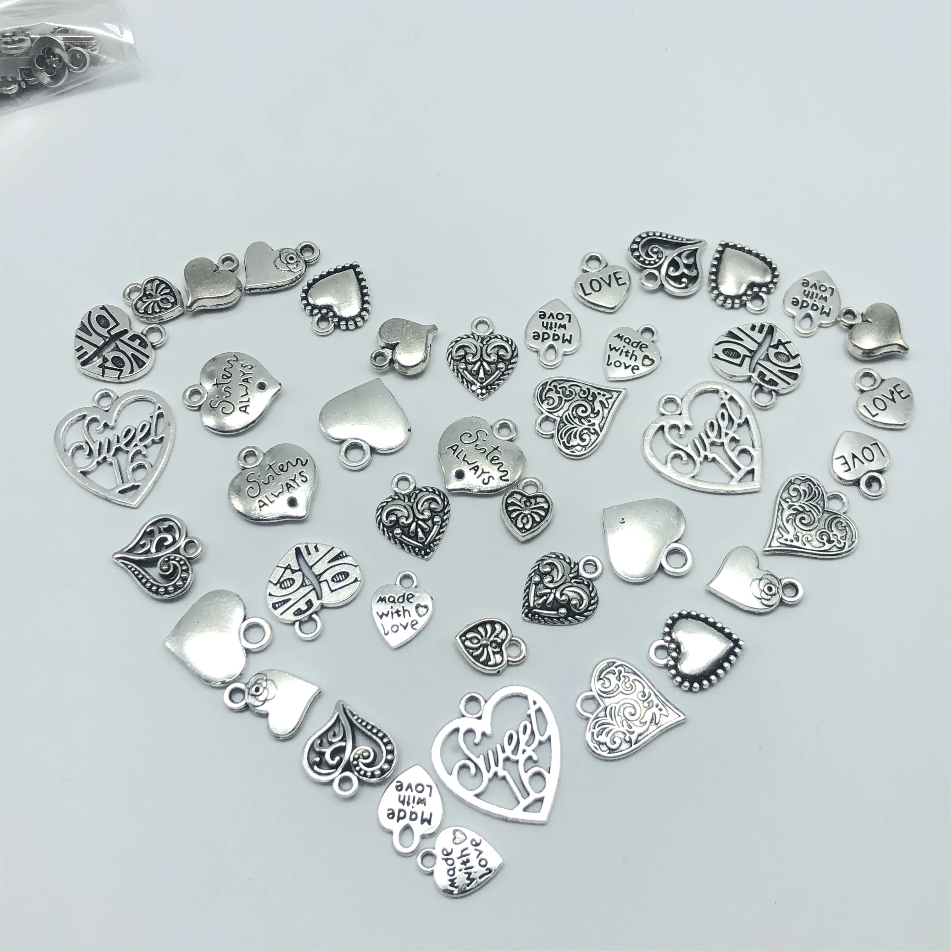 JunKang 30pcs Mixed batch Alloy Tibetan silver heart jewelry charm pendant classic DIY fashion findings
