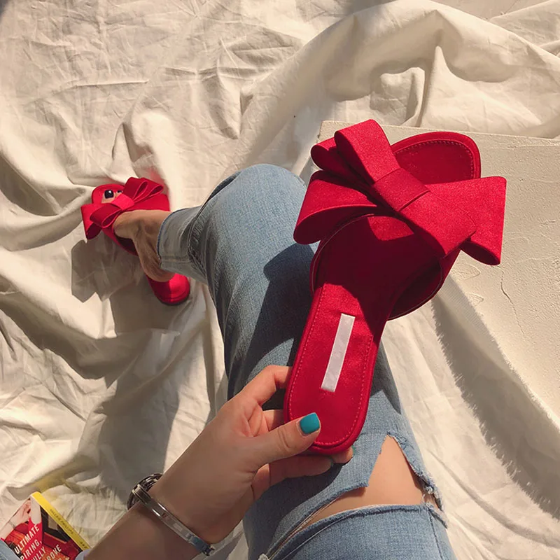 Wearing flat slippers women\'s shoes 2019 Korean version of the summer new large bow satin round head sandals Wild half slippers