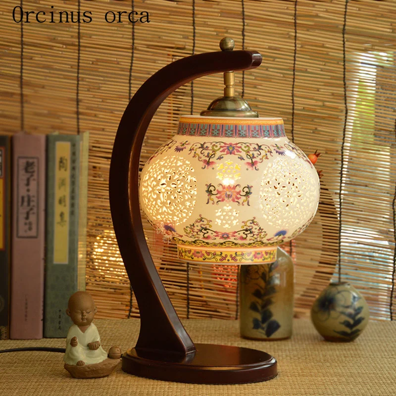 

New Chinese classical hollow led ceramic table lamp bedroom bedside lamp American Pastoral creative solid wood desk lamp