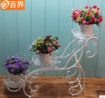 European-style balcony and indoor living room three layer shelf floor a few flowerpot wearing flower gardening