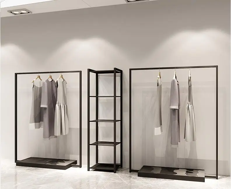 

Clothes hanger. Display rack. Men's and women's clothing racks. Shelves. Display cabinets.056