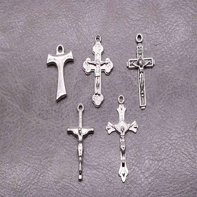 10 pieces of many styles of tiny Dongzheng Jesus cross. Catholic Mini Cross. Bead necklace accessories