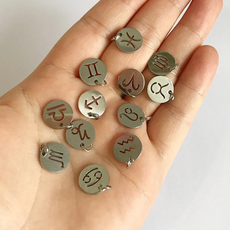 12 sztuk/partia wisiorek ze stali nierdzewnej zodiak Charms znaki DIY biżuteria bransoletka akcesoria do tworzenia naszyjników