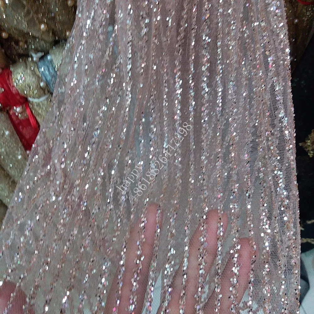 

The latest high-end French yarn light pink, sparkling sequins and beads light glue Nigeria high-end wedding dress fabric craft /