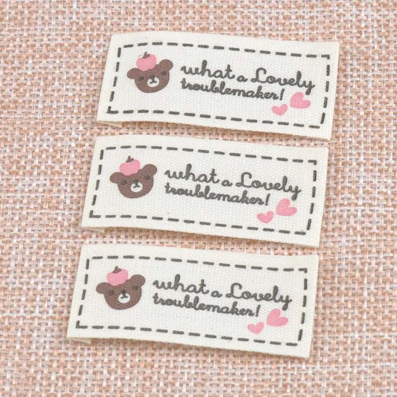 50pcs Beige Woven Labels For Clothing Care Labels Cartoon Bear Woven Labels Clothing Shoes Bags Washable Garment Tags CP1532