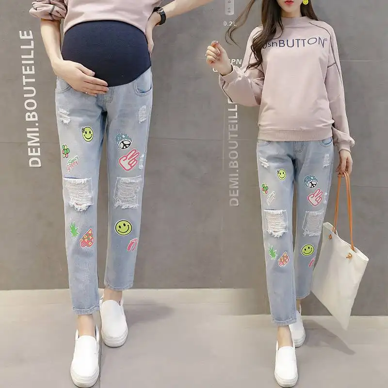 Autumn and winter maternity dress pregnant women jeans new jeans fashion print hole pregnant women