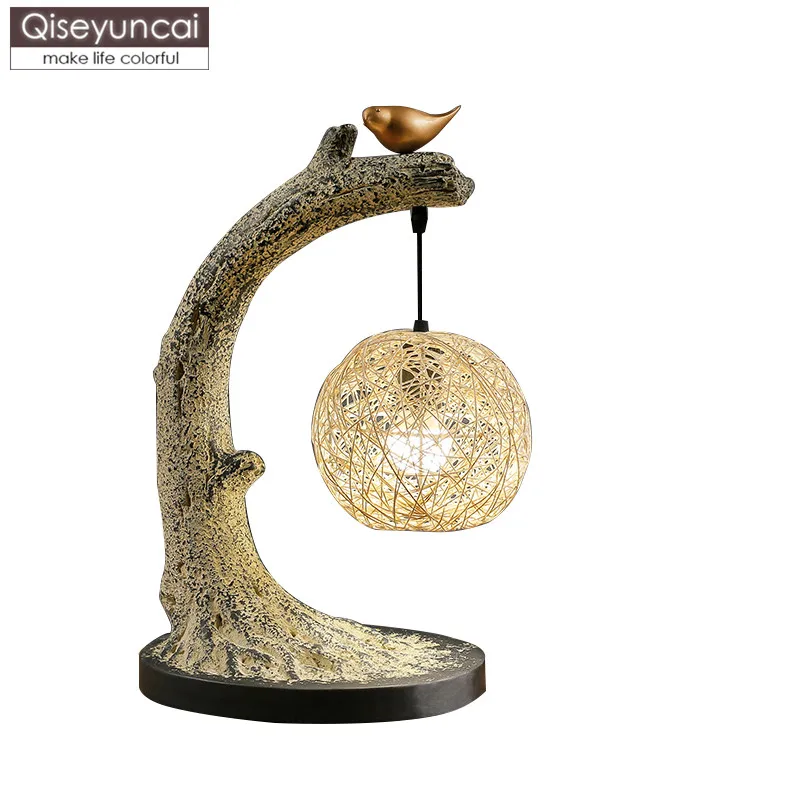 

Qiseyuncai New Chinese warm table lamp retro art living room study bedroom zen zen bird decoration table lamp free shipping