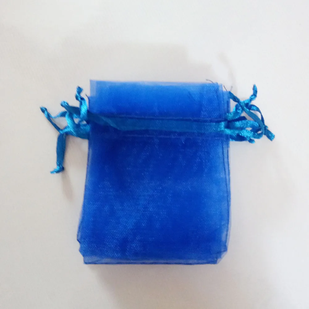 100 Uds. Bolsas de regalo de color azul real, bolsas de joyería y embalaje, bolsa de Organza, bolsa con cordón, bolsas de exhibición de almacenamiento de viaje para boda/mujer