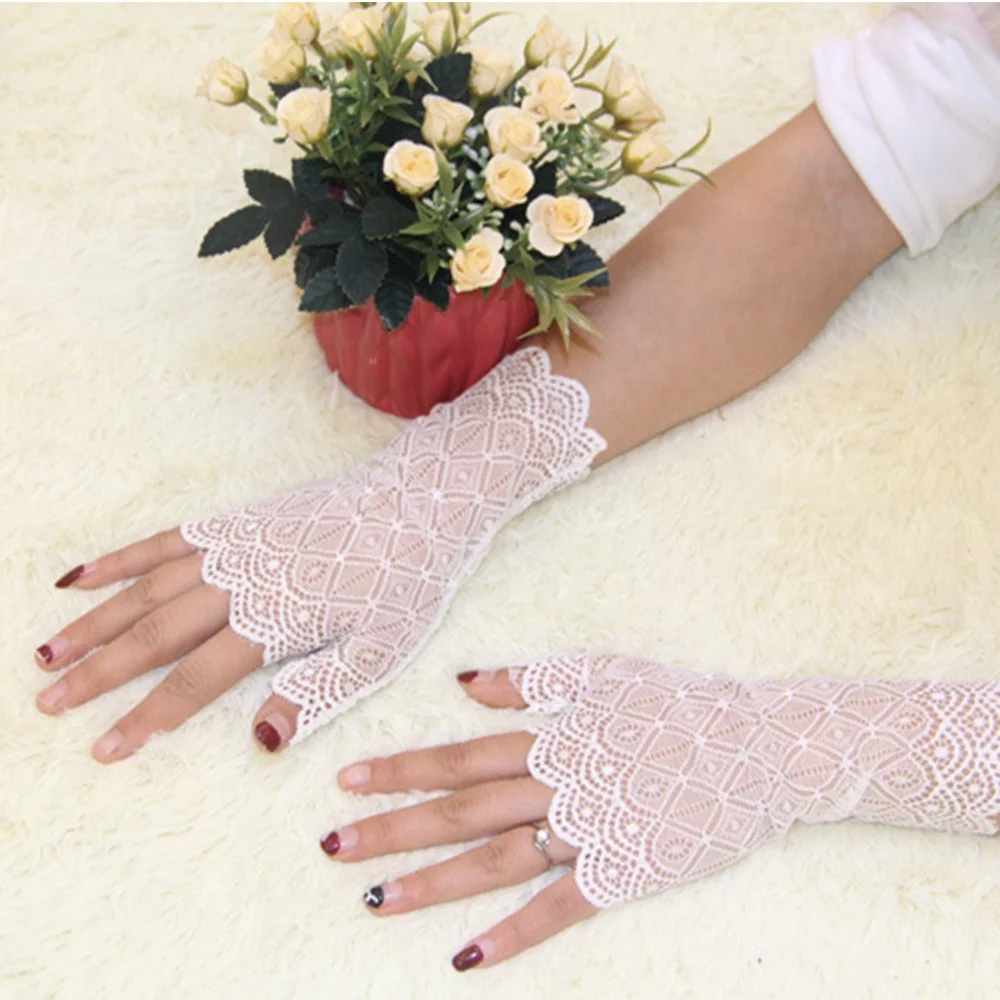 Feminino elegante encantador protetor solar luvas sem dedos feminino condução anti-uv rendas luvas de festa transparente elástico luvas