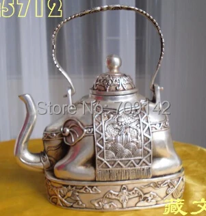 

Decoration buddhist bronze coated silver elephant shape figure teapot 13 cm tall lucky statue Tibet Miao Antique Old Silver