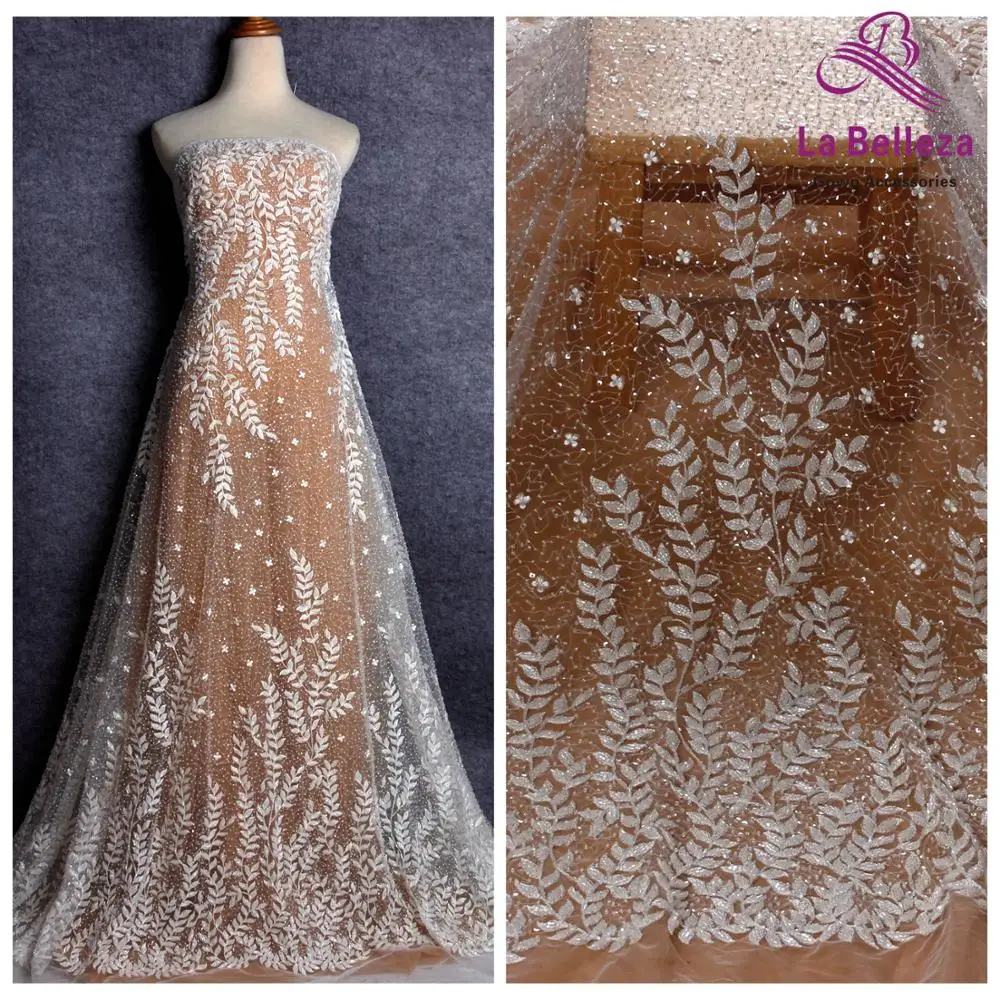 

La Belleza new wedding dress lace fabric off white beaded sequins lace fabric leaves lace 1 yard