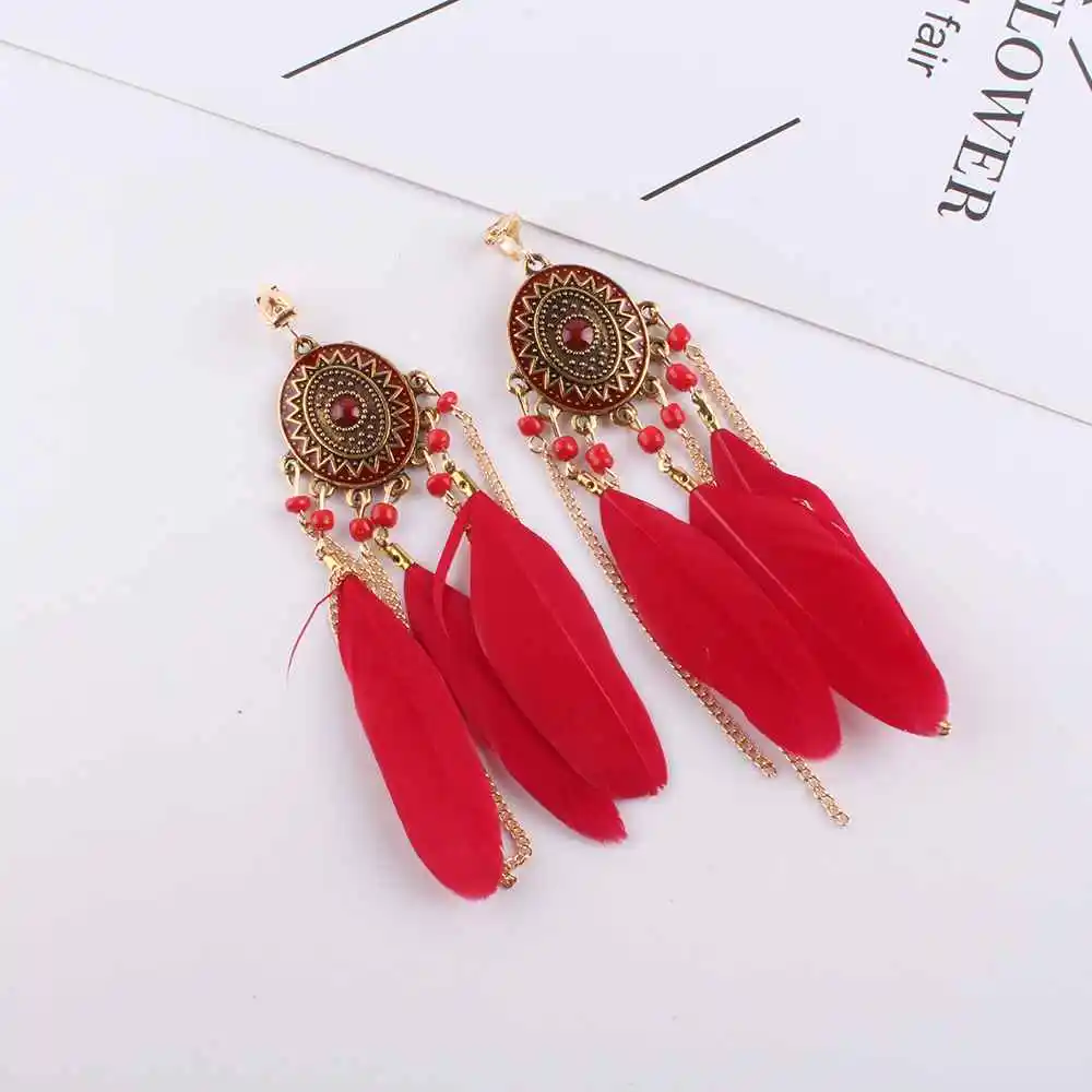 Pendientes bohemios de plumas esmaltadas para mujer, aretes largos con borla, sin Piercing, bisutería femenina, 2018