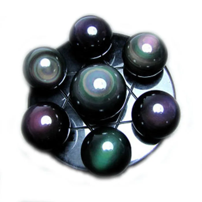 

Natural obsidian seven star array pieces of obsidian rainbow eye crystal ball