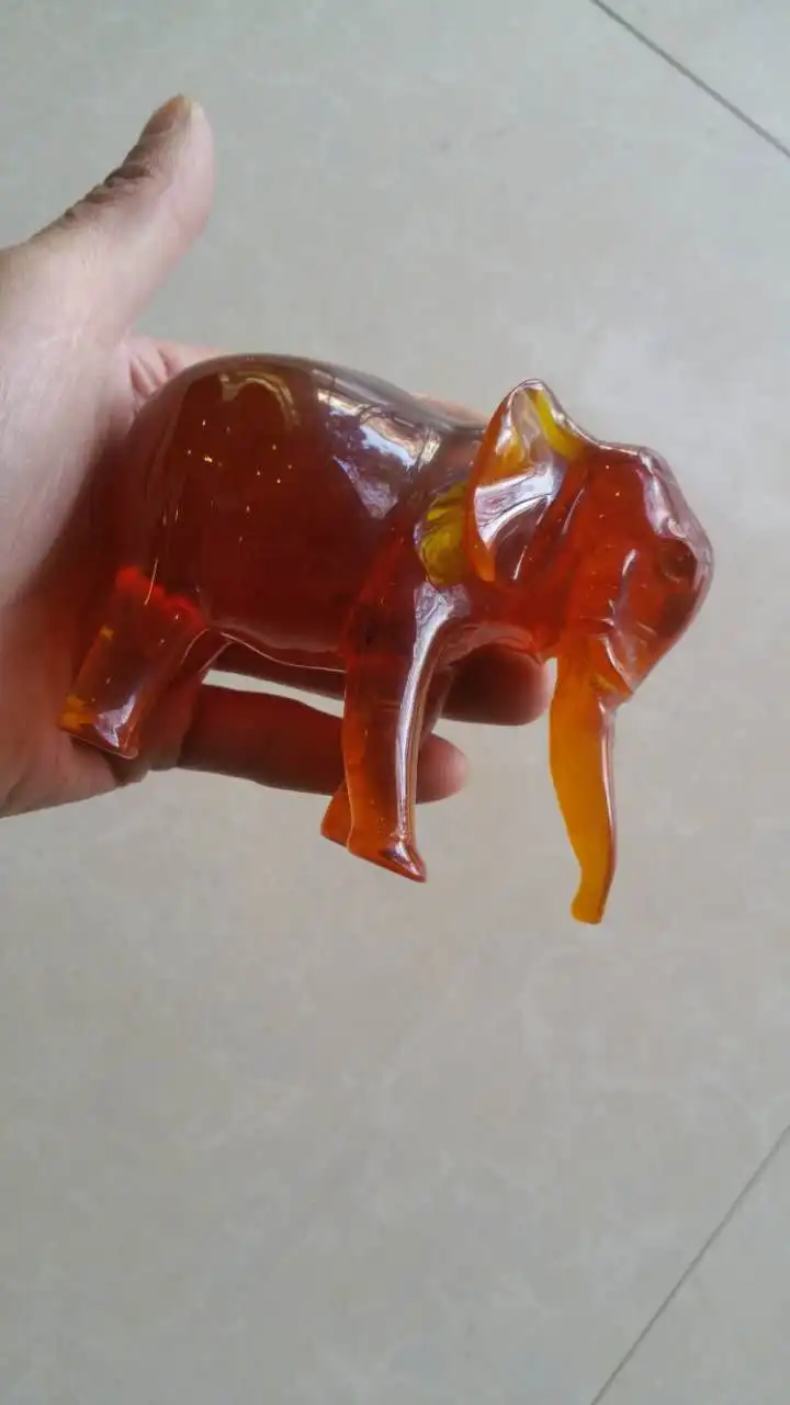 Elaborate Chinese Manual Red Resin Auspicious Elephant statue