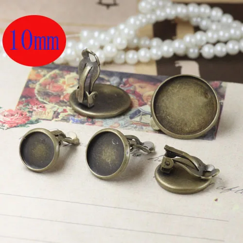 

Free shipping!!! 200pcs 10mm Bronze color Flat Pad Clip On Earring Findings/Round Cabochon Settings Earring Clips