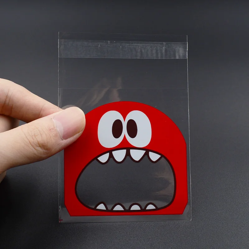100pcs 7cm x 7cm+3 OPP Cute small Monster Sharp teeth Baking Christmas Gift Packaging Bags Wedding Cookie Candy Plastic bag