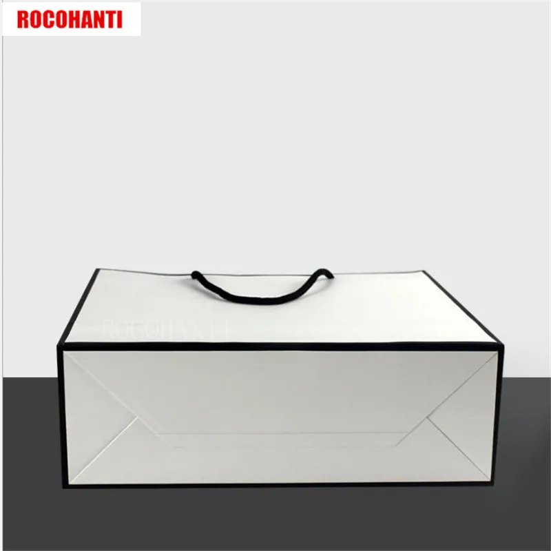 10/100 pezzi Logo personalizzato grande borsa per la spesa in carta bianca con bordo nero e manico a nastro per confezione regalo di vestiti