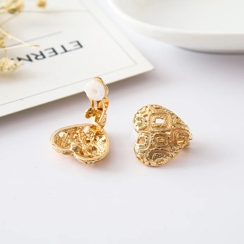 COWNINE Alloy Lovely hearts earrings Hot melting Lovely hollow out hearts earrings ear clip Popular peach heart pendant