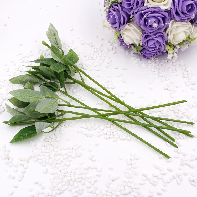 

Simulation of artificial plastic stem leaves rose stem/silk/wedding decoration holding a rose flower Long 35CM