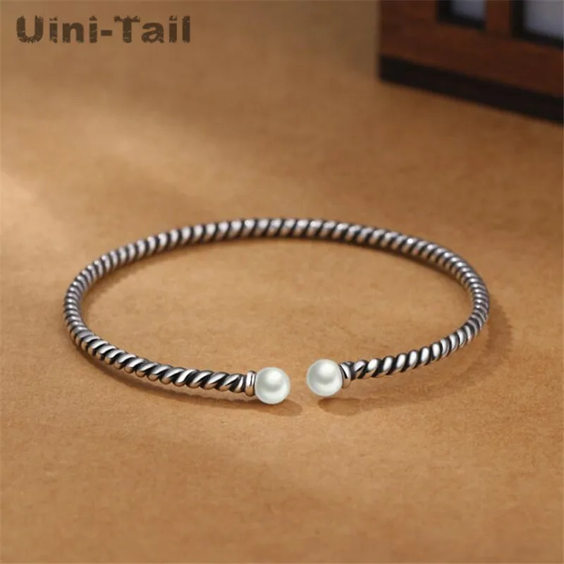 Uini-Tail classic hot 925 Tibetan silver Korean personality simple twist woven pearl bracelet Thai silver opening old bracelet