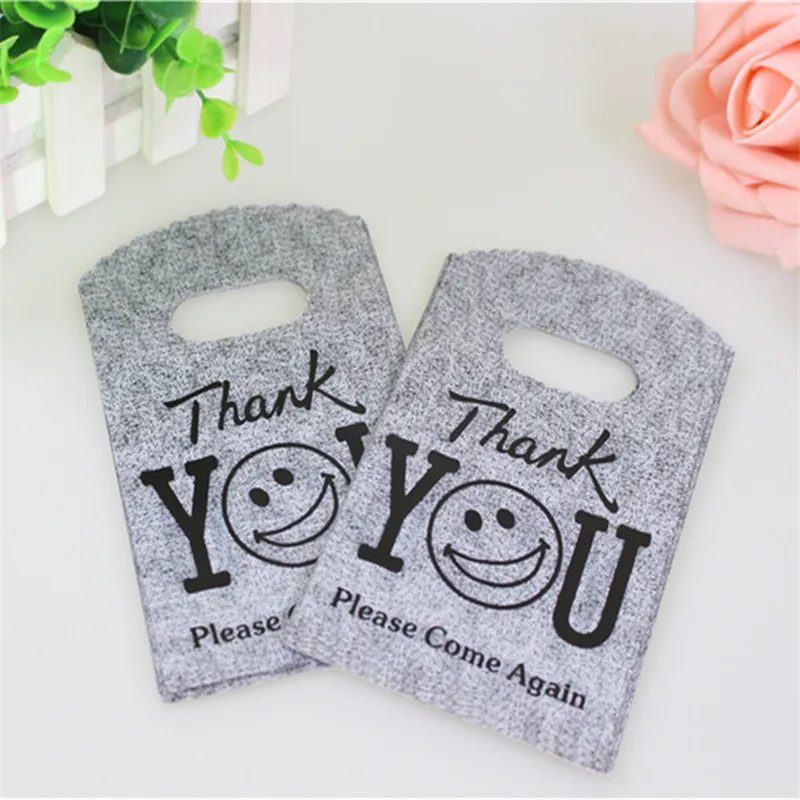 50pcs/lot 9*15cm Lovely Gray Mini Thank You Gift Bags Smile Face Small Plastic Shopping Bags for Small Business Hot Sale