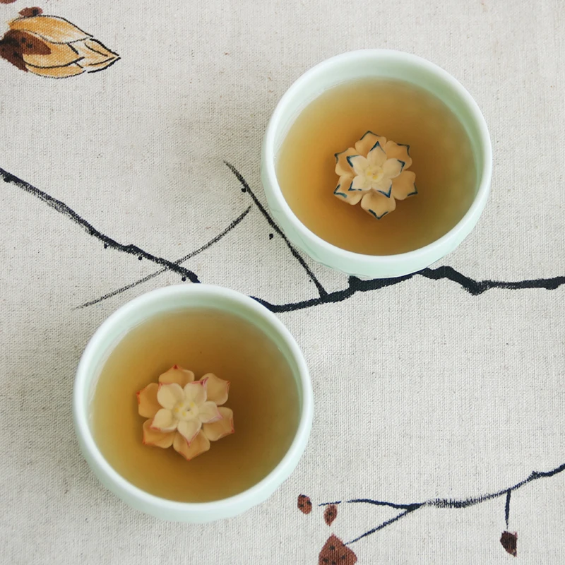 one cup porcelain longquan celadon Chinese kungfu tea cup creative lotus flower relief cup for Pu\'er tea 50ml master cup of tea