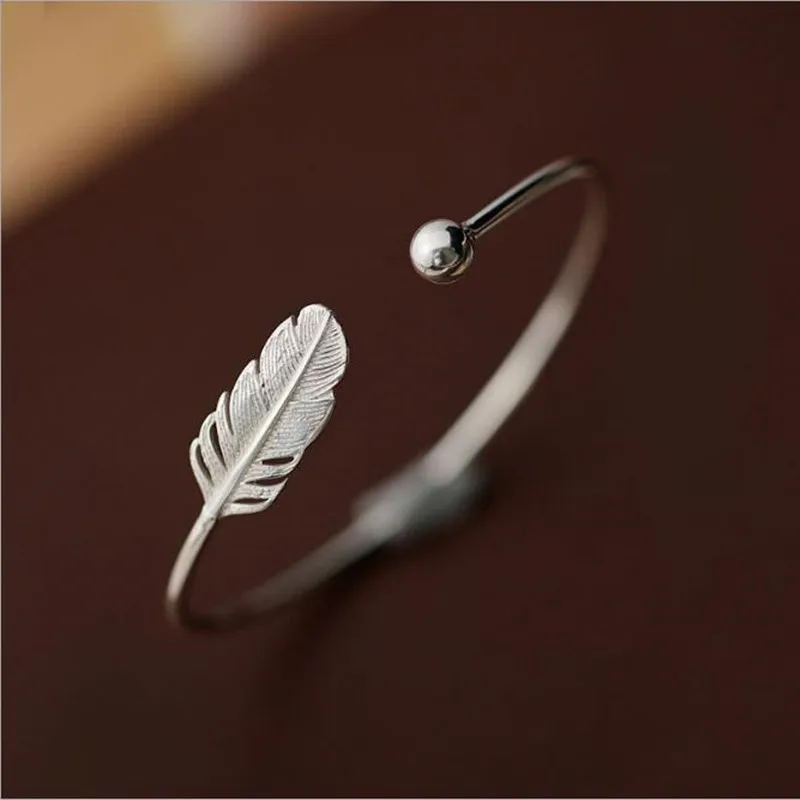 New Fashion 925 Sterling Silver Jewelry Not Allergic High-quality Female Simple Feather Small Ball Open Bracelets   SL009