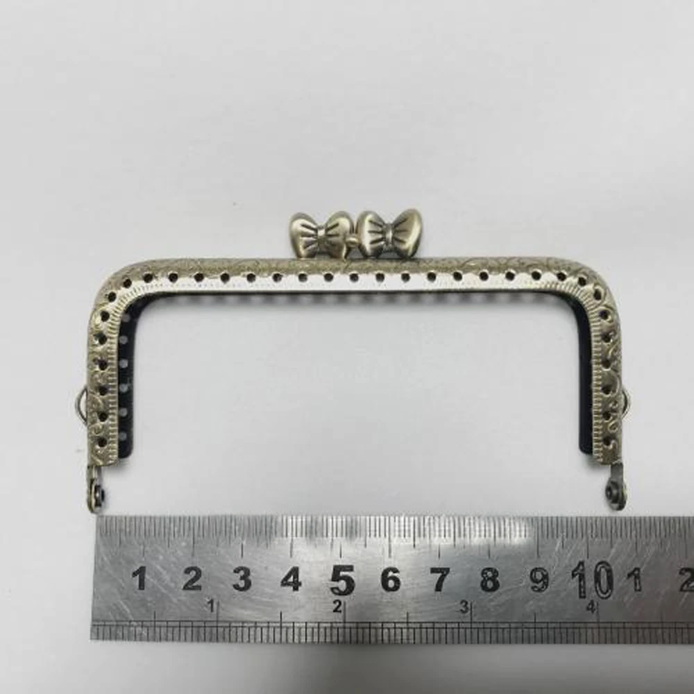 10.5cm vintage bronze color tie kiss buckle design women coin bag metal purse frame clasp 10pcs/lot handbag hardware