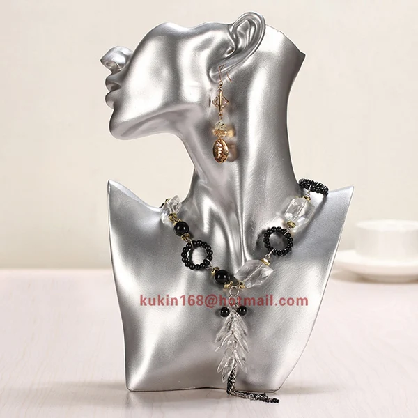 Female torso mannequin used for earring display, Head mannequin with shoulder