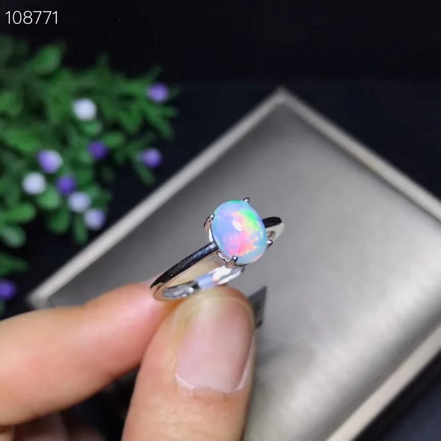 Shop new products, recommended by the owner Natural opal woman rings  fire color mysterious  925 silver adjustable size