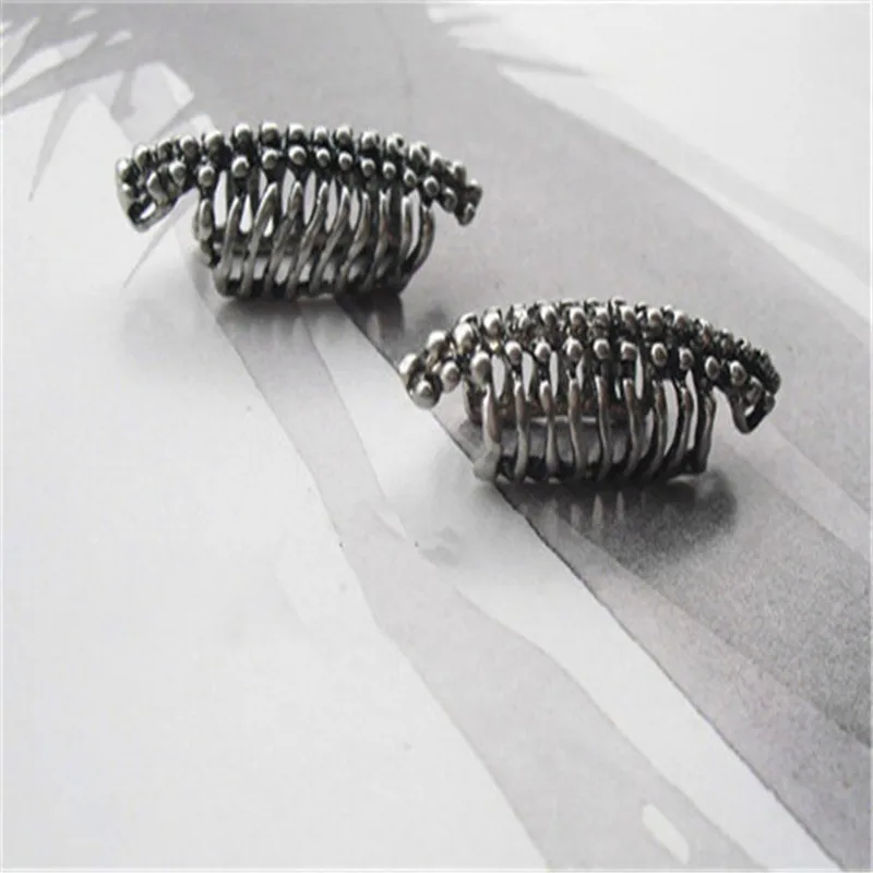 New punk wind cool skeleton spine ear clip ear studs men and women without earrings earrings jewelry wholesale