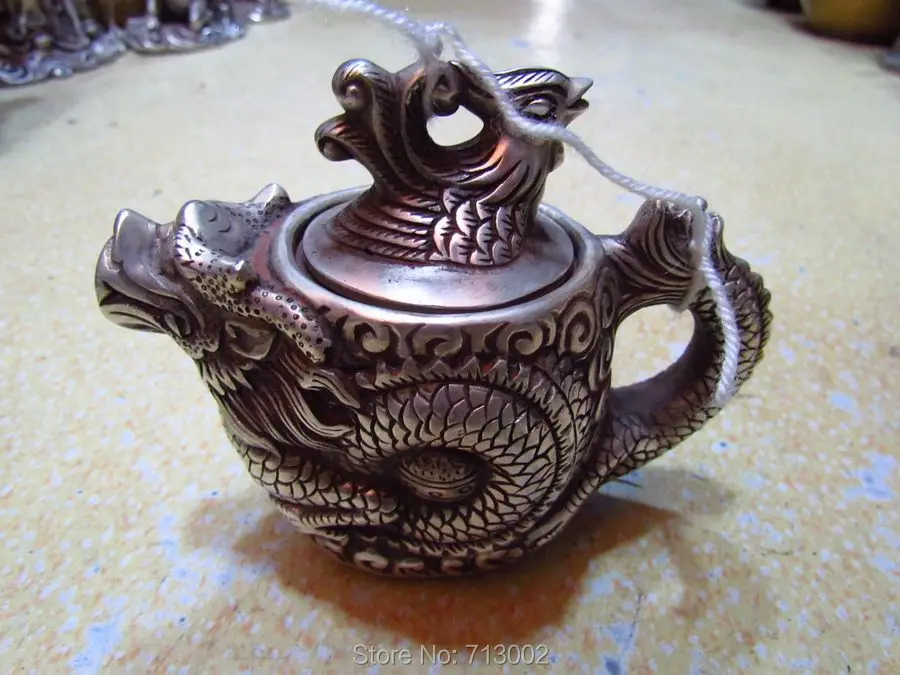 

Vintage Tibetan Silver Teapot flagon Signed Base Dragon Phoenix Design Shape