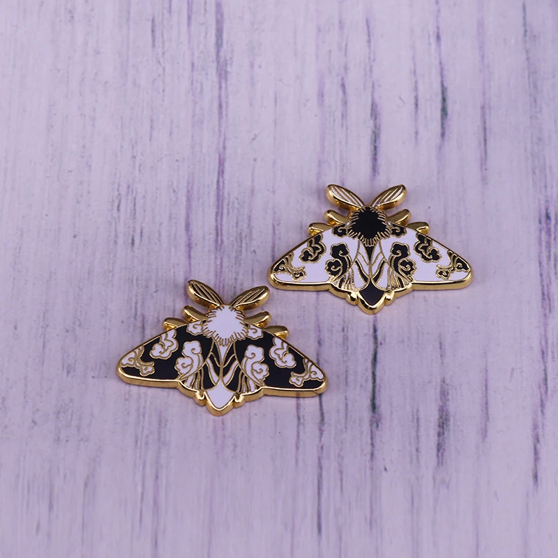 

Cloud Moths enamel pin set