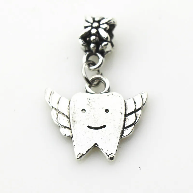 

Hot Selling 30pcs Wing Tooth Dangle Charms Macroporous Beads Charm Diy Fashion Bracelet Jewelry Floating Charms