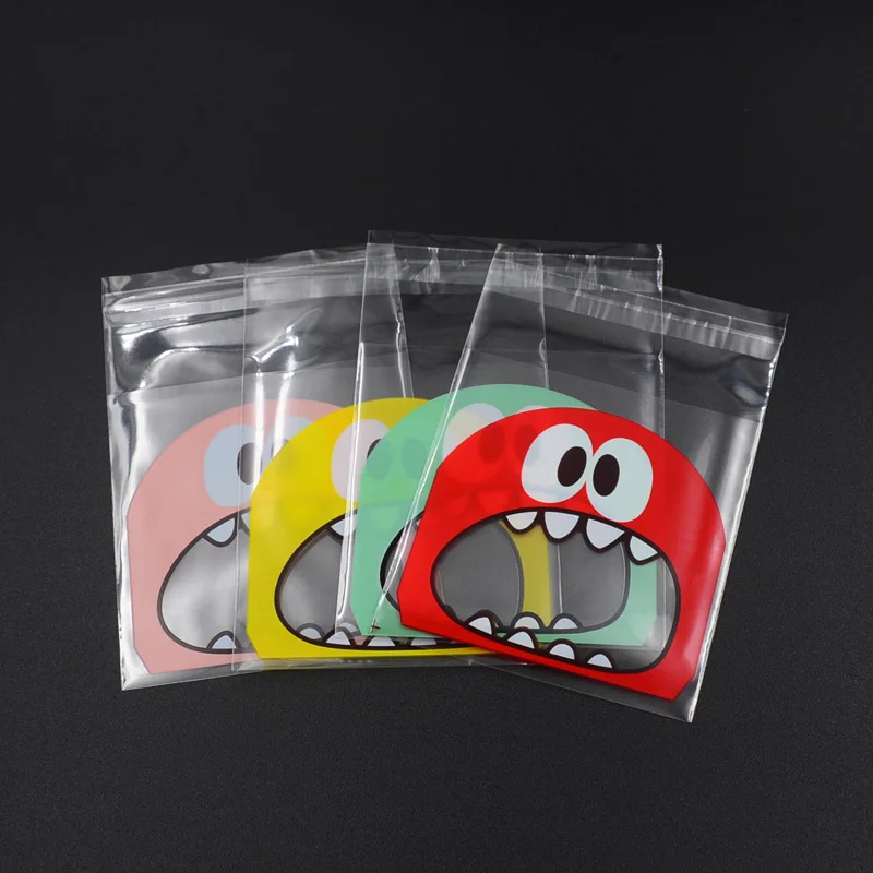 100pcs 7cm x 7cm+3 OPP Cute small Monster Sharp teeth Baking Christmas Gift Packaging Bags Wedding Cookie Candy Plastic bag