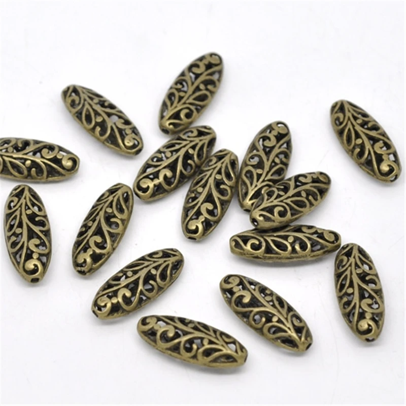 20 PCs Doreen Box Hollow Flower Oval Shape Spacer Beads Bronze Color 23x9mm Vintage DIY Jewelry Making Accessories， Hole: 1.2mm