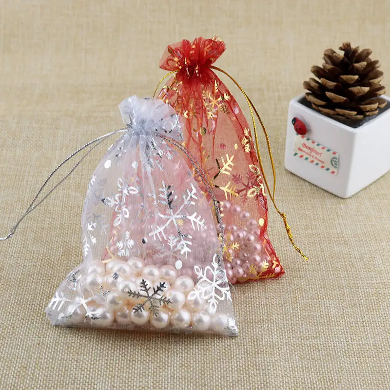 Bolsas de Organza de copo de nieve blanco, bolsitas pequeñas con cordón de 7x9, 10x14, 13x18cm para regalo de Navidad, bolsitas bonitas para embalaje de joyería, 50 unidades por lote