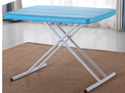 Foldable computer desk. Home portable dinner. Simple table of outdoor stalls picnic table.