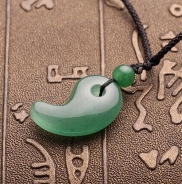 Pure natural crystal  Dongling jade lovers magatama handiwork Tai chi Yin and Yang fish buckle Crescent spike free shipping