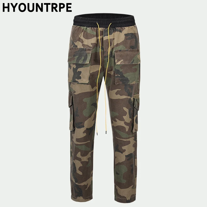 Pantaloni Hip Hop mimetici da uomo tasche con bottoni inferiori pantaloni Cargo moda elastico in vita con coulisse abbigliamento sportivo Streetwear
