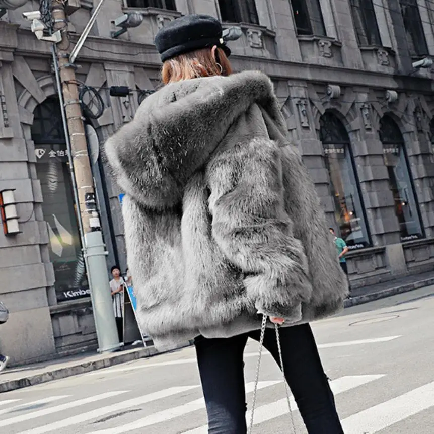 High-end faux fox fur coat female Winter fashion women's hooded fake fur coat patchwork fur warm outwear casual outwear L1676