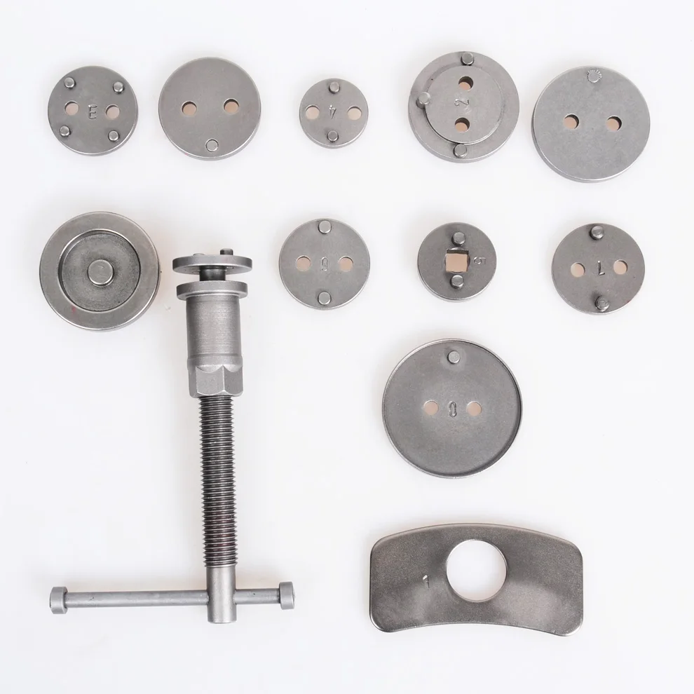 12 ชิ้นยานยนต์ดิสก์เบรกลูกสูบ Caliper Pad ชุดรถลมกลับมือชุดเครื่องมือ
