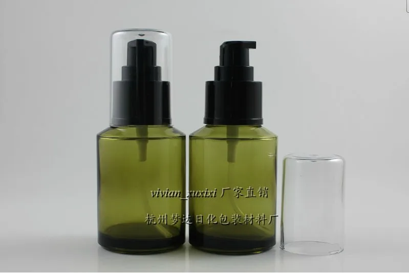 

50pcs wholesale 2 ounce glass green color round lotion bottle with black pump , empty 60 ml glass cosmetic bottle for liquid