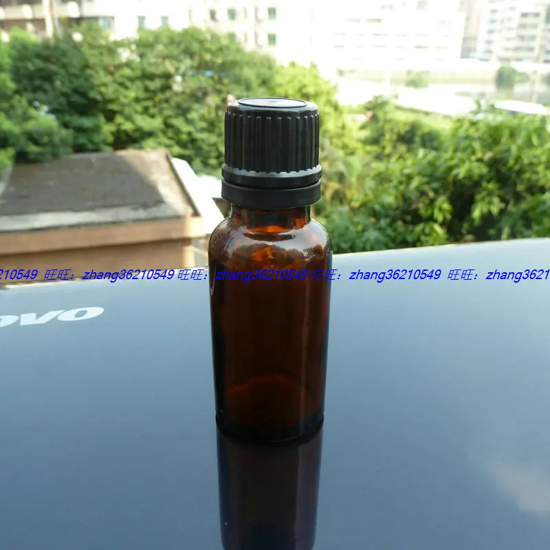 

20ml brown/amber Glass Essential Oil Bottle With black plastic burglarproof cap. Oil vial, Essential Oil Container