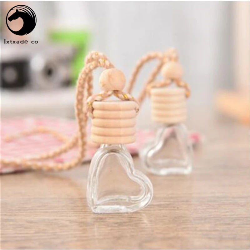 Free Shipping New Style 5 ml Clear Heart-shaped Glass Perfume Essential oil Empty Bottles Rounded Car perfume Bottles pendant