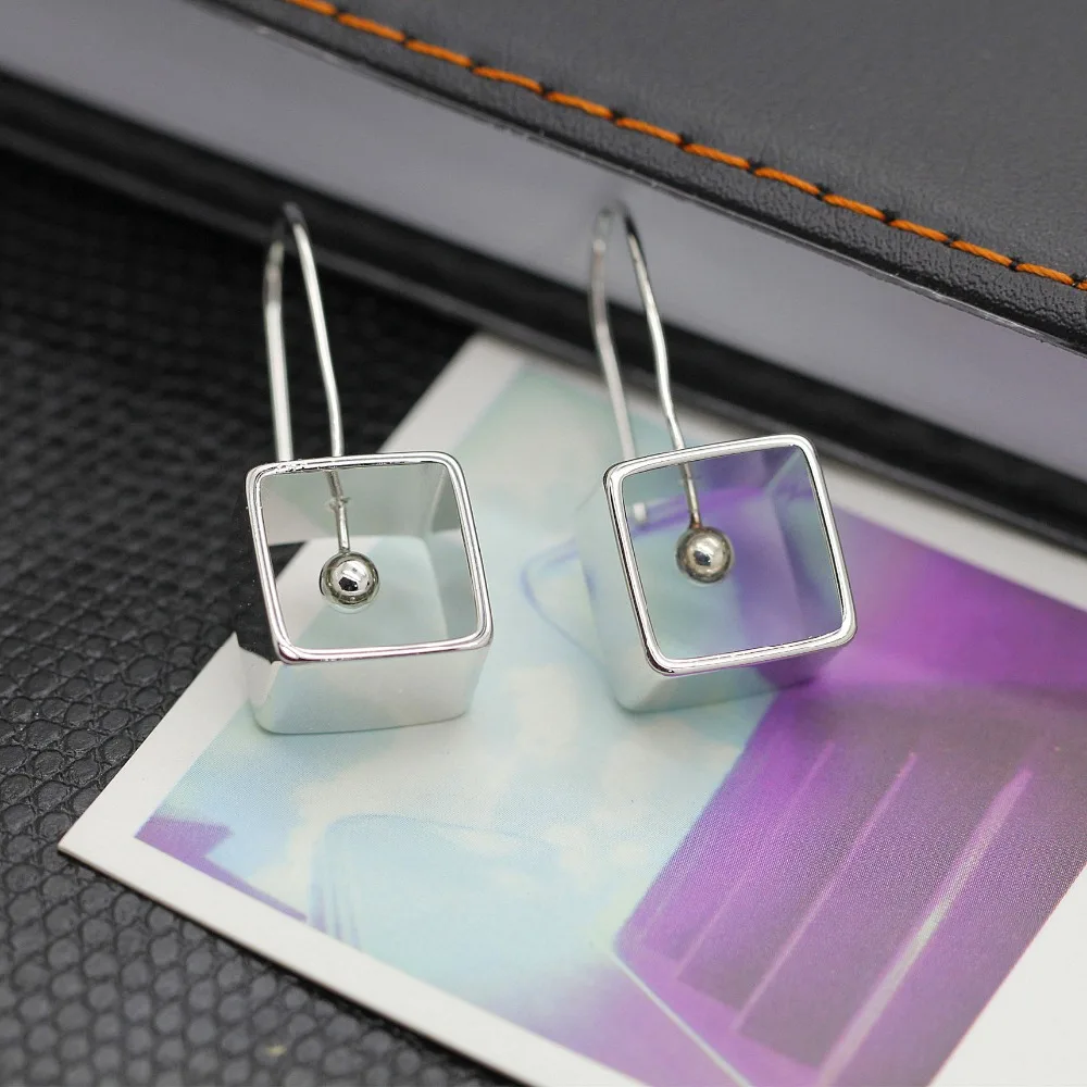 Design geometric pendant female earrings about exaggerated punk fashion studs