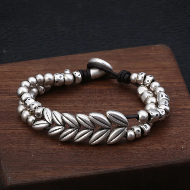 

Wholesale S999 Sterling Silver Retro Thai Silver Hand-made Wheat Ears Pattern Creative Leather Rope Men And Women Bracelet Homme