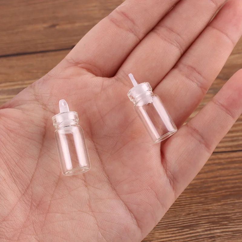 100pcs 11*22*6.5mm 1ml Mini Glass Wishing Bottles Tiny Jars Vials With Plastic Stopper